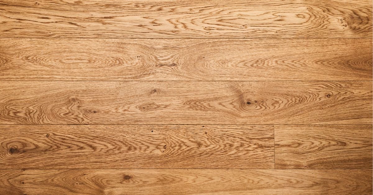 Close-up of a wooden floor showcasing intricate wood grain patterns and textures.