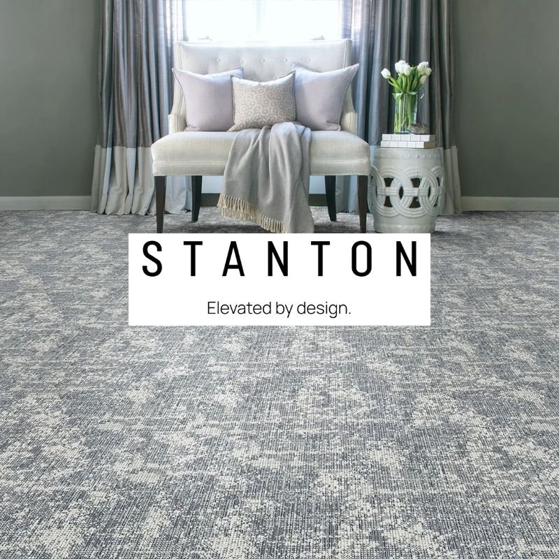A stanton carpet covers the living room floor, adding warmth and texture to the space.