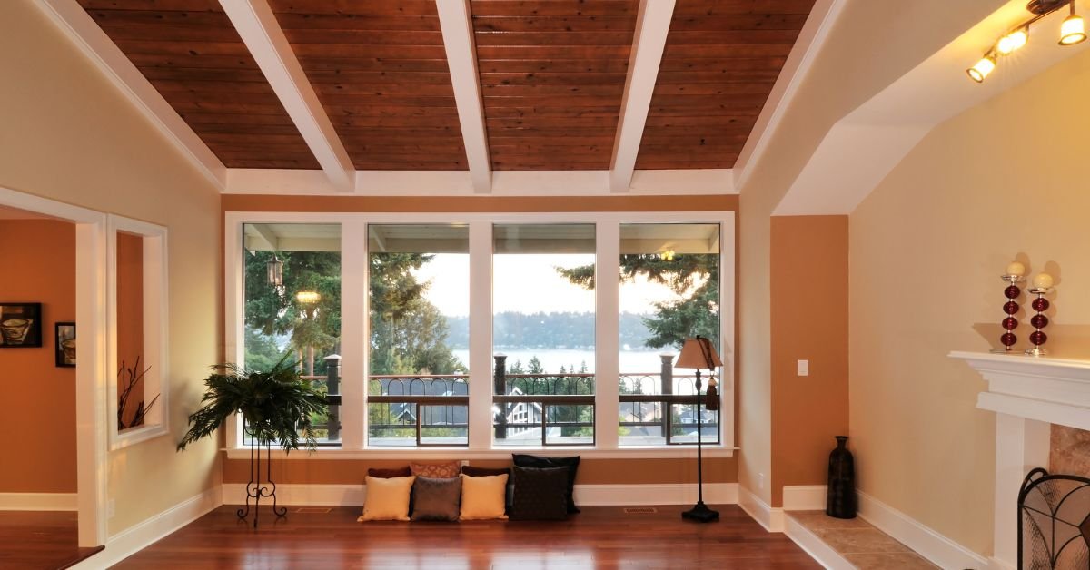 A stylish living room with polished hardwood floors and a classic fireplace, enhancing the room&#x27;s charm.