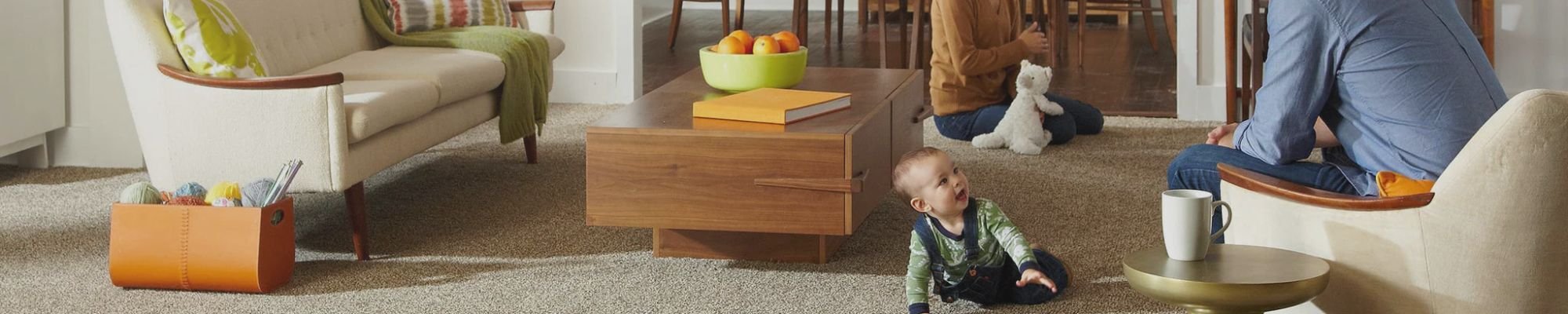 A woman and a child are reading a book side by side, enjoying a quiet moment of storytelling and bonding.
